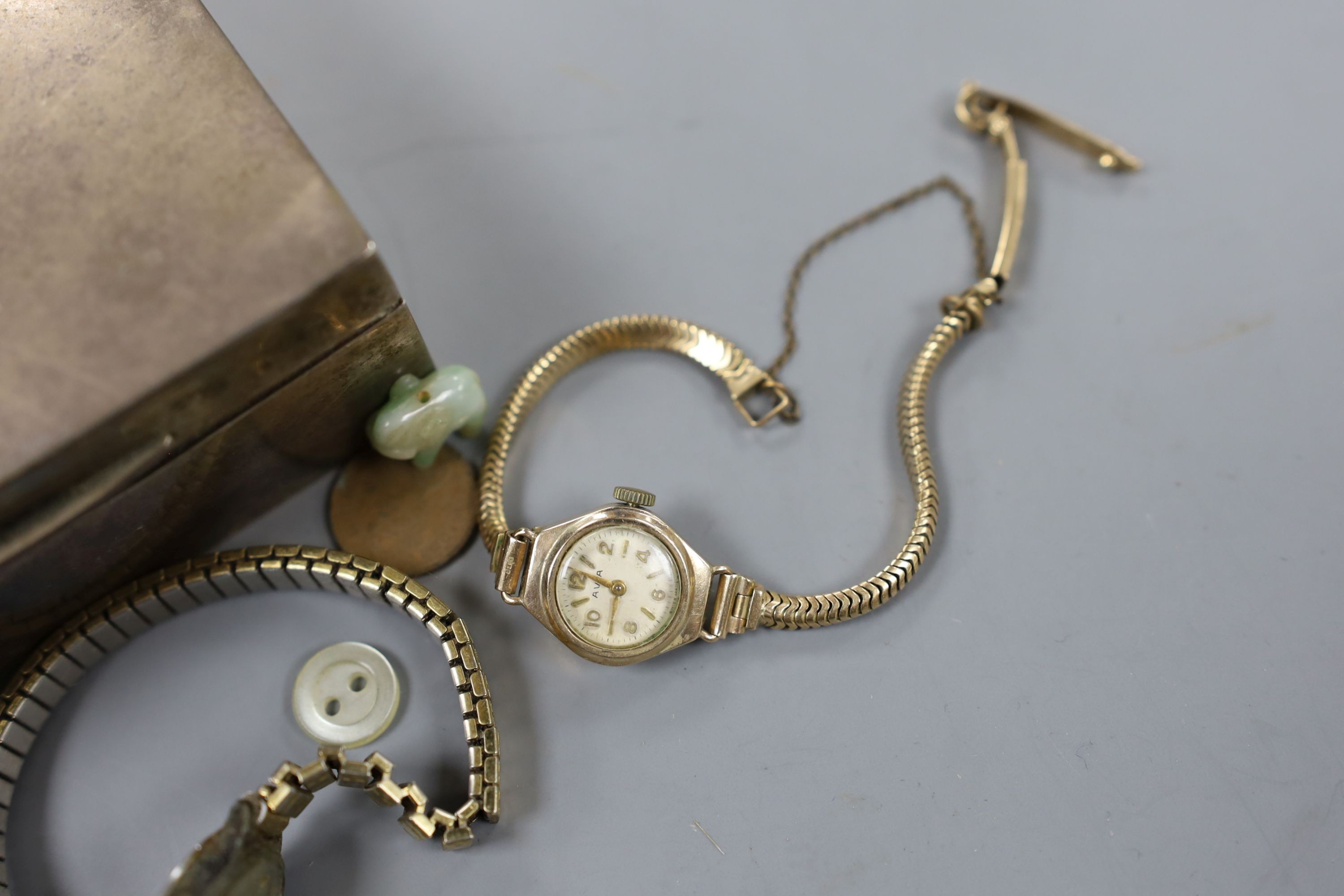 A small silver cigarette box, a silver wrist watch and a lady's 9ct gold Avia wrist watch, gross 15.1 grams.